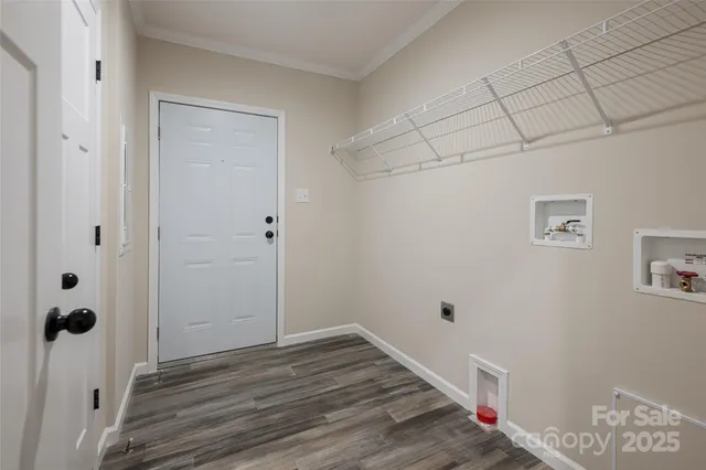 a view of small space with wooden floor