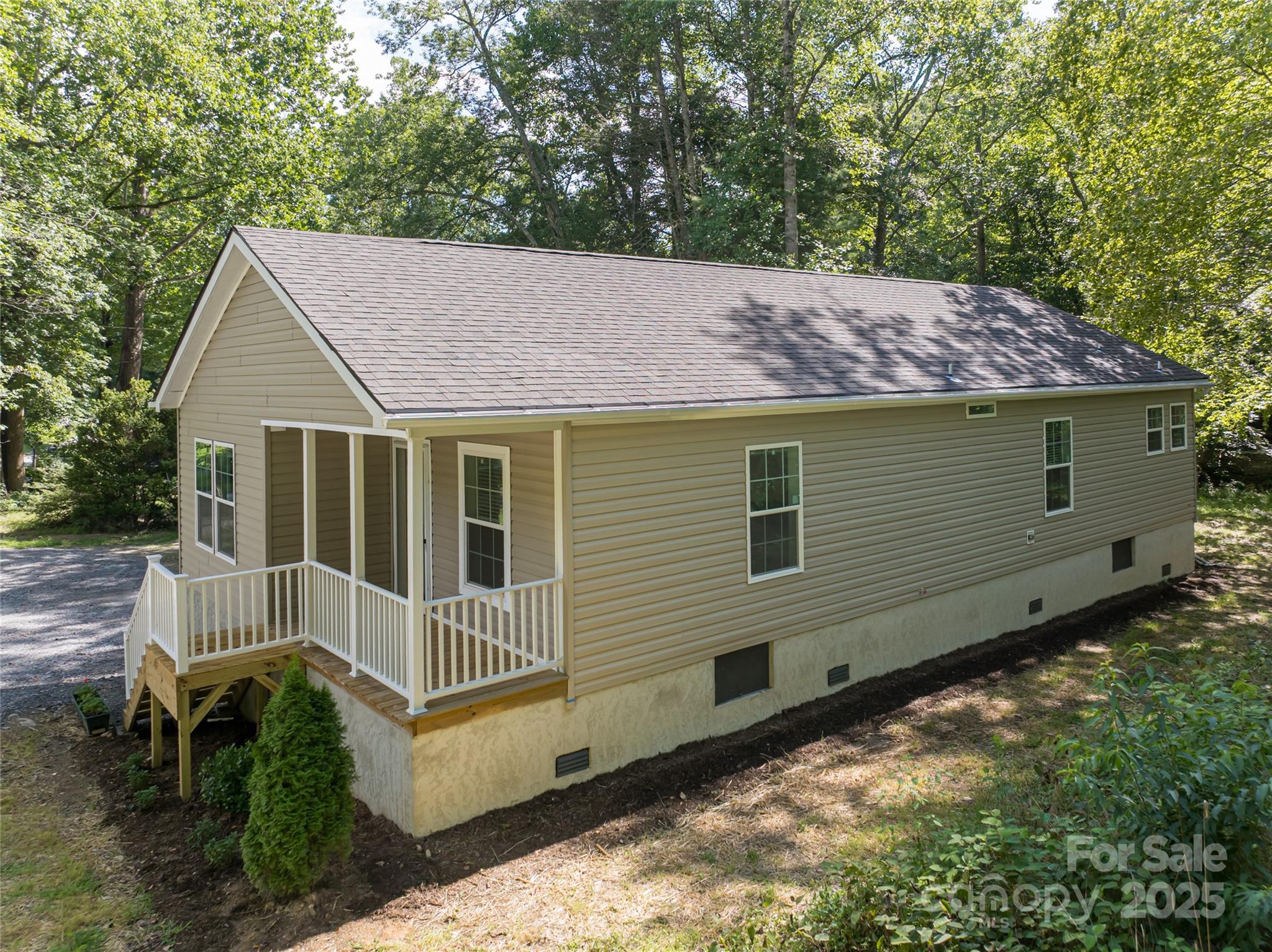 321 Flat Creek Road Black Mountain, NC 28711 - Photo 40 of 44 a view of house with backyard and sitting area
