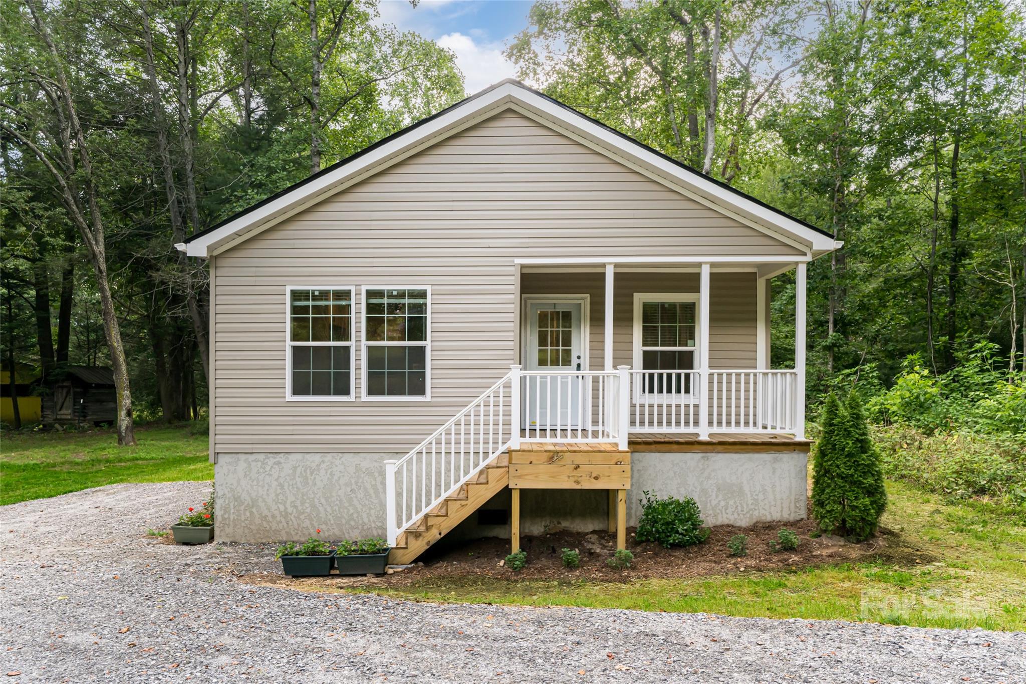 321 Flat Creek Road Black Mountain, NC 28711 - Photo 44 of 44 a house view with a backyard space