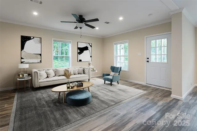 a living room with furniture and a window