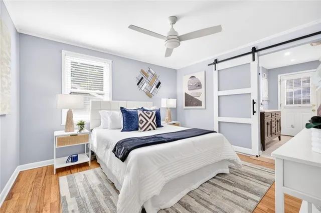 a bedroom with a bed and a table