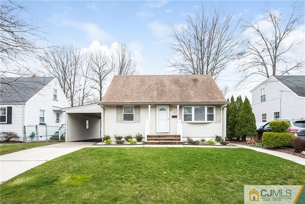 41 West Cliff Road Colonia, NJ 07067 - Photo 1 of 23 a front view of house with yard and outdoor seating