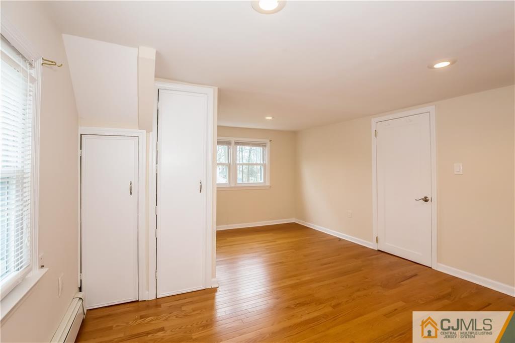 41 West Cliff Road Colonia, NJ 07067 - Photo 17 of 23 a view of an empty room and window