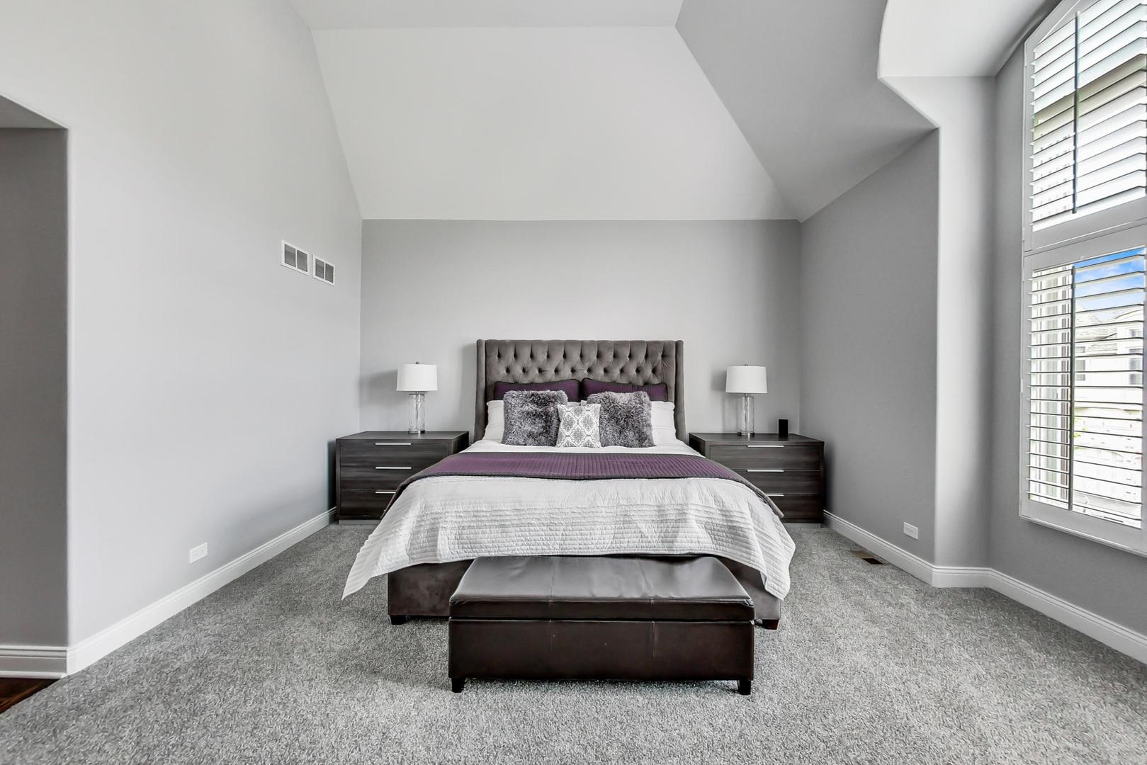 1415 Rue Paris Place Inverness, IL 60067 - Photo 18 of 35 a bedroom with a bed and window