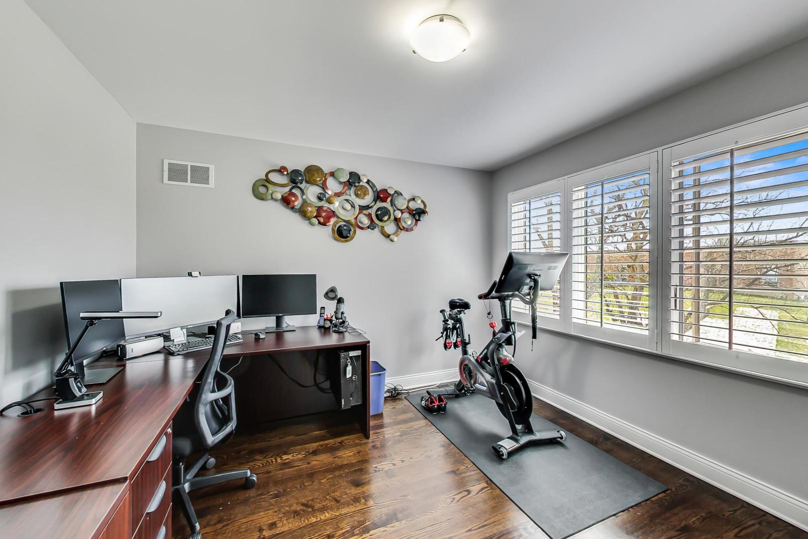 1415 Rue Paris Place Inverness, IL 60067 - Photo 23 of 35 a view of a workspace with furniture and a window