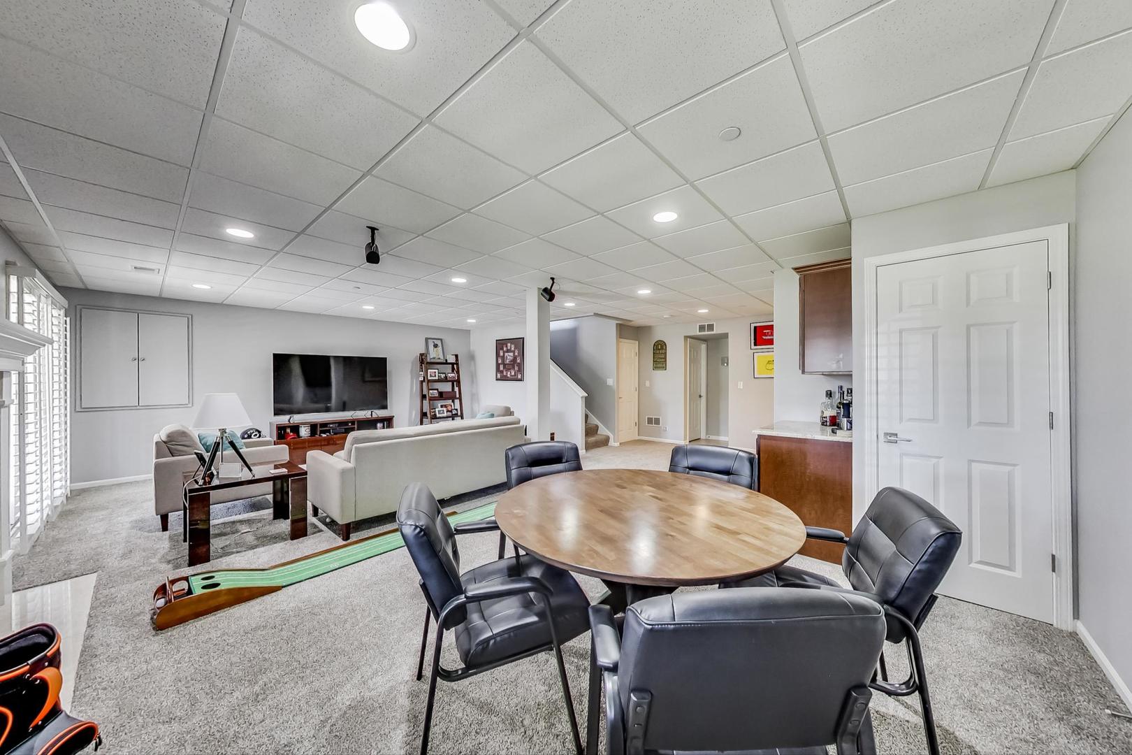 1415 Rue Paris Place Inverness, IL 60067 - Photo 26 of 35 a view of a dining room with furniture