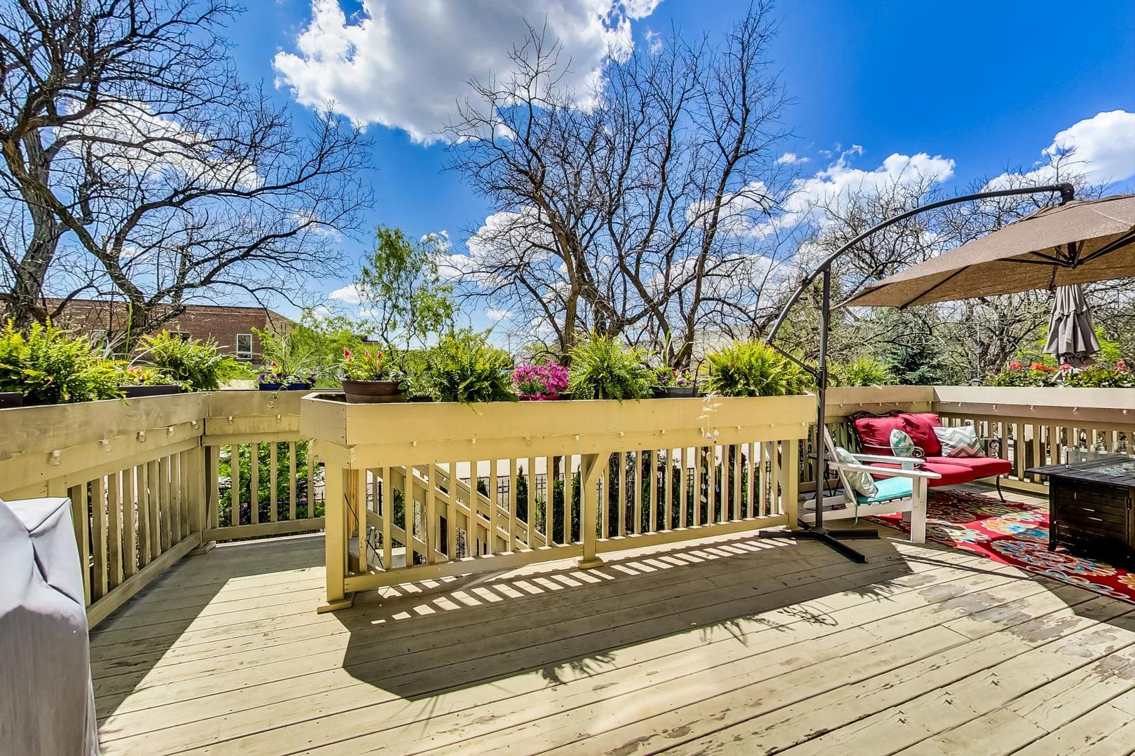 1415 Rue Paris Place Inverness, IL 60067 - Photo 30 of 35 a view of terrace with wooden floor and outdoor seating