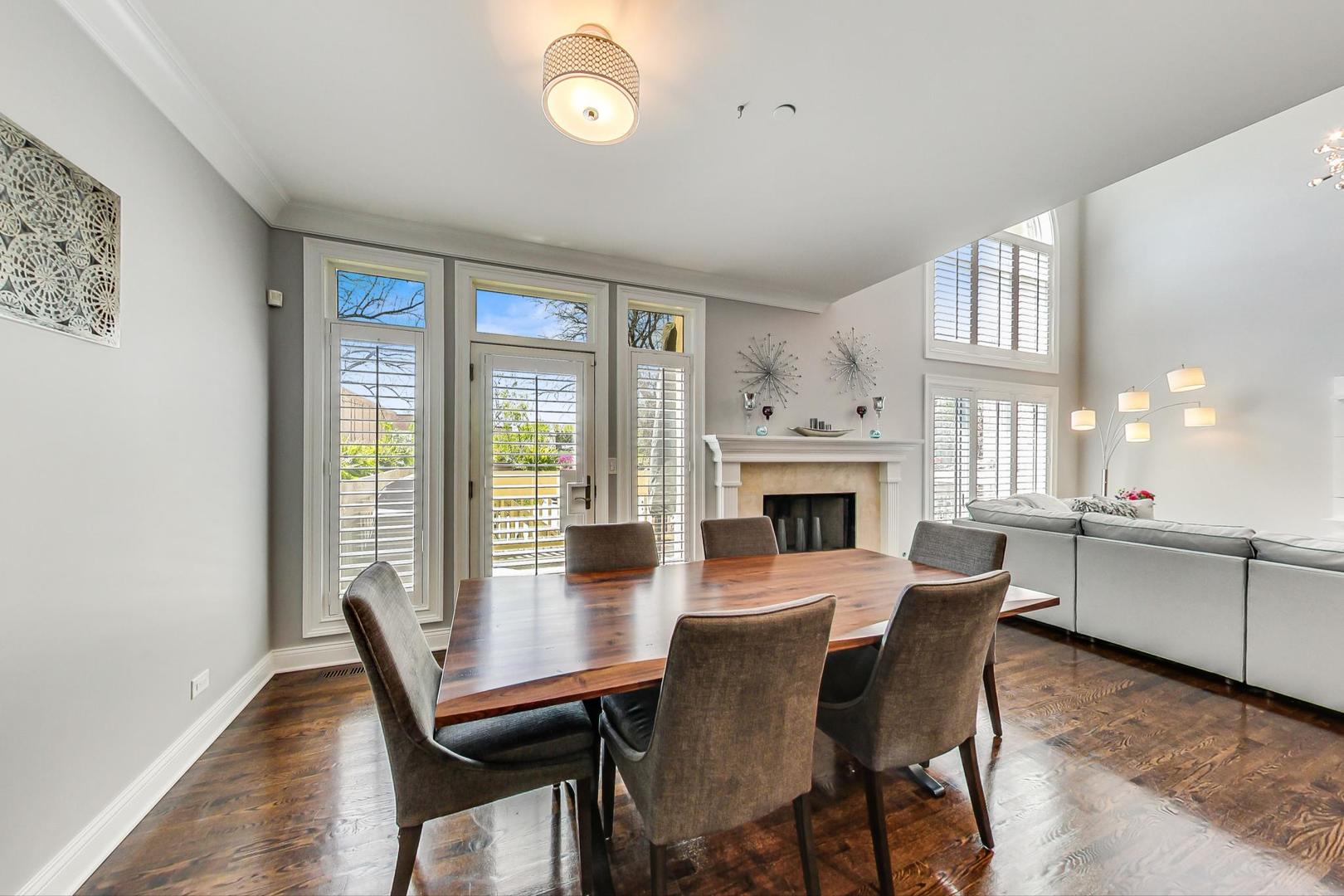 1415 Rue Paris Place Inverness, IL 60067 - Photo 8 of 35 a view of a dining room with furniture window and wooden floor