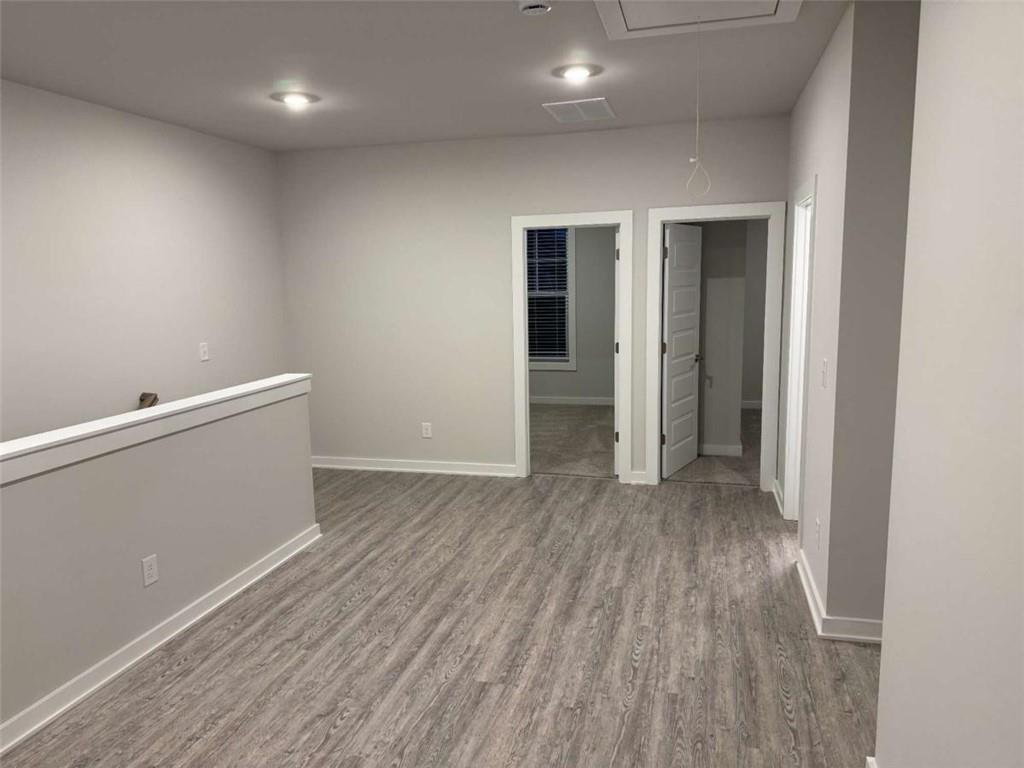 2530 Harbor Ridge Gainesville, GA 30507 - Photo 26 of 44 wooden floor in an empty room with wooden floor