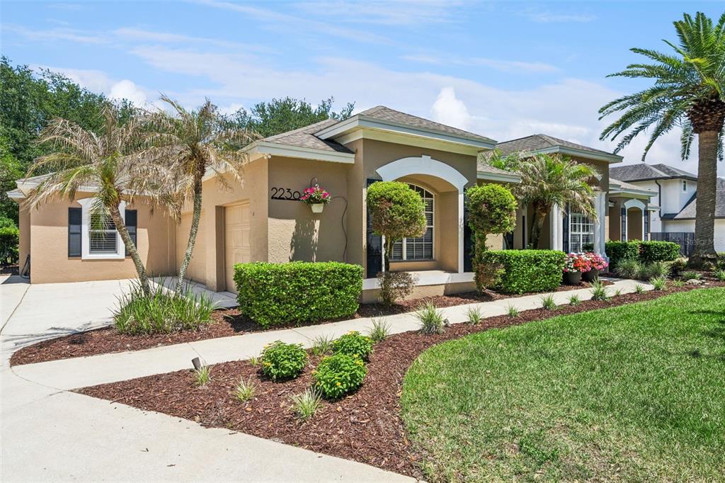 2230 Ridgewind Way Windermere, FL 34786 - Photo 3 of 38 a view of a house with a patio