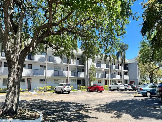 a view of a street with cars