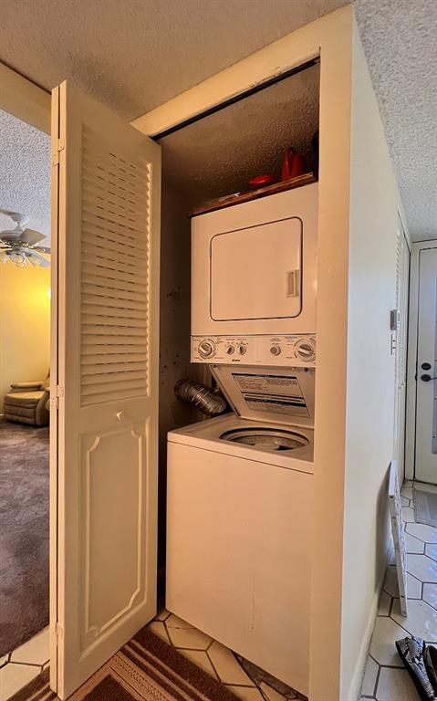 8305 Northwest 61st Street, Unit 203 Tamarac, FL 33321 - Photo 5 of 13 a utility room with dryer and washer