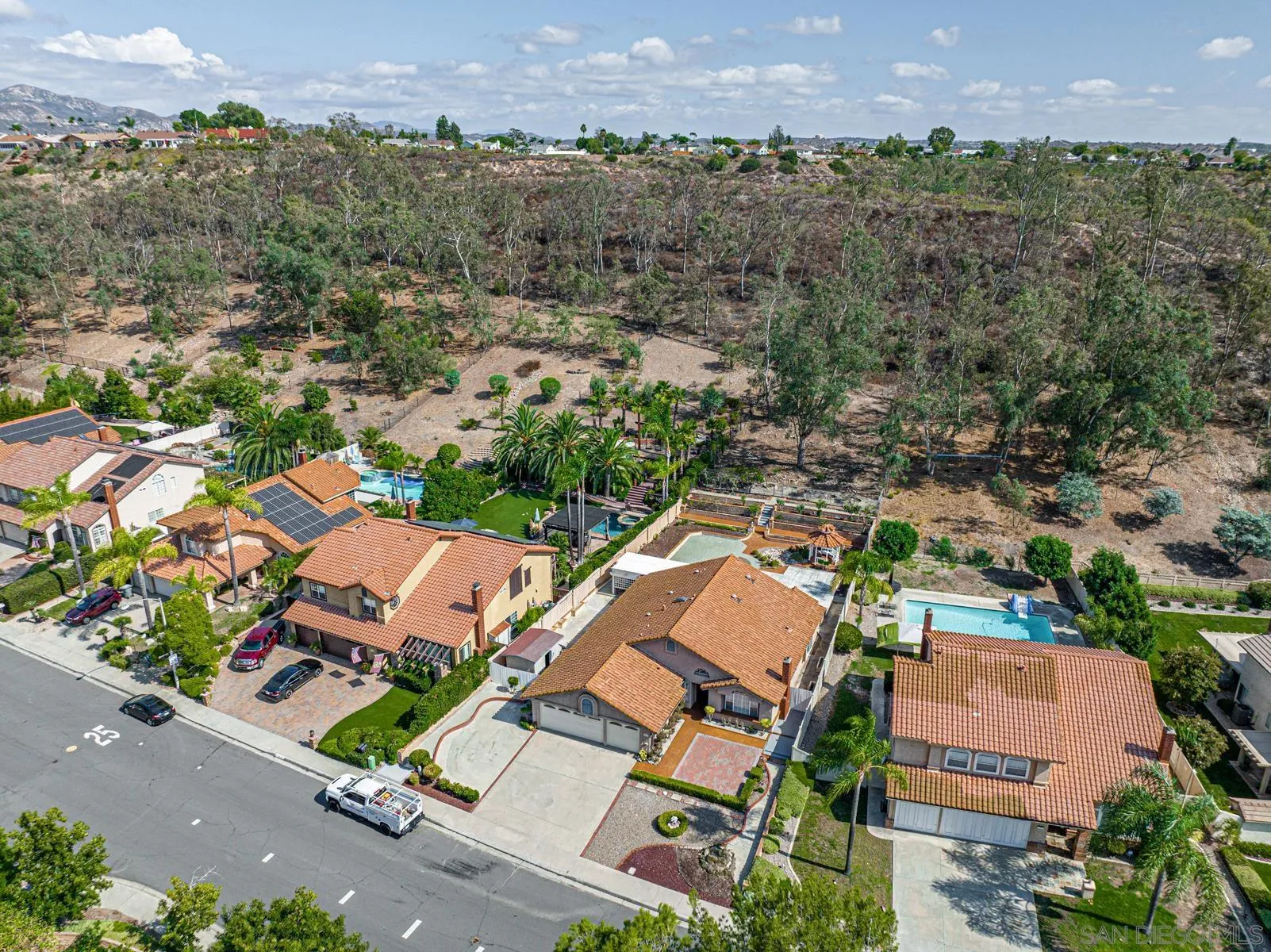 13893 Carriage Road Poway, CA 92064 - Photo 19 of 71 an aerial view of residential houses with outdoor space
