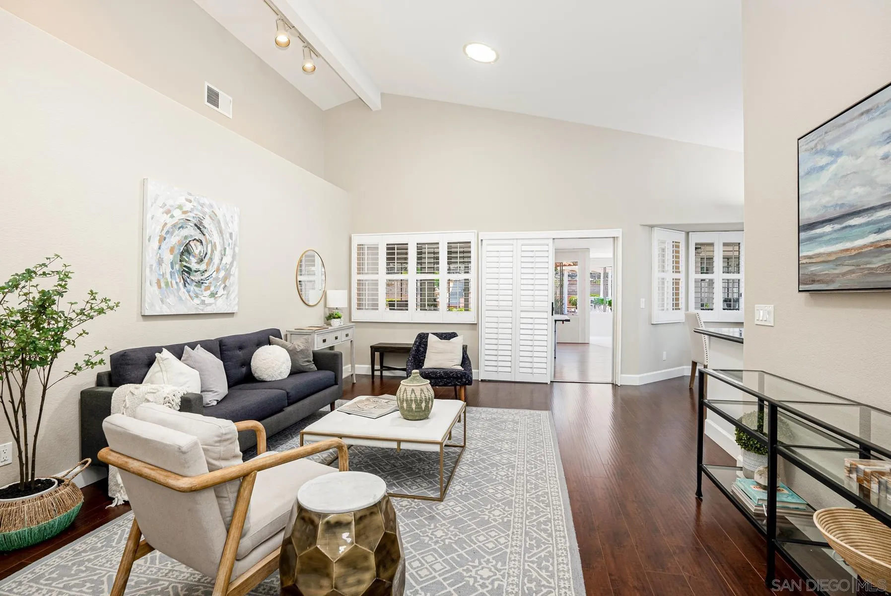 13893 Carriage Road Poway, CA 92064 - Photo 23 of 71 a living room with furniture and wooden floor