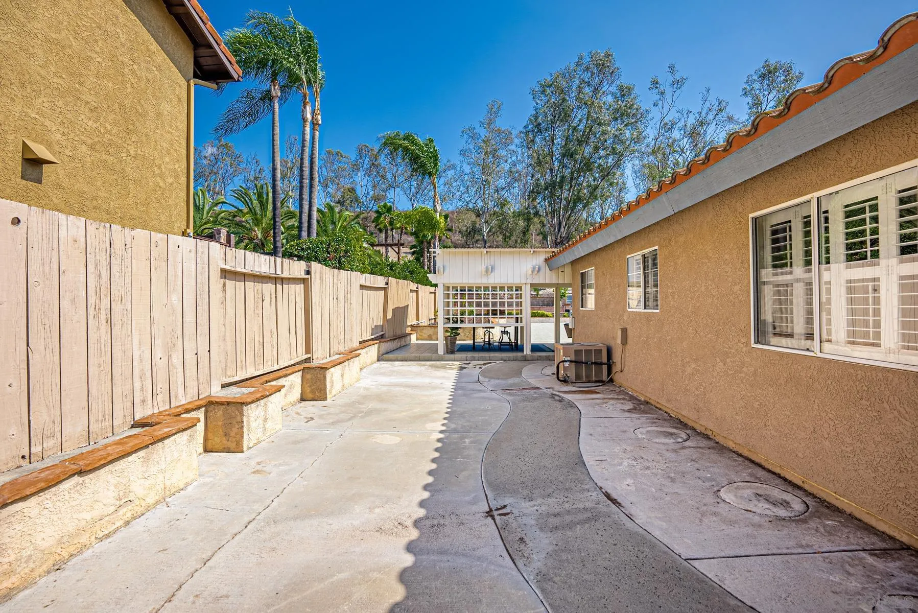 13893 Carriage Road Poway, CA 92064 - Photo 41 of 71 a view of a house with backyard and sitting area