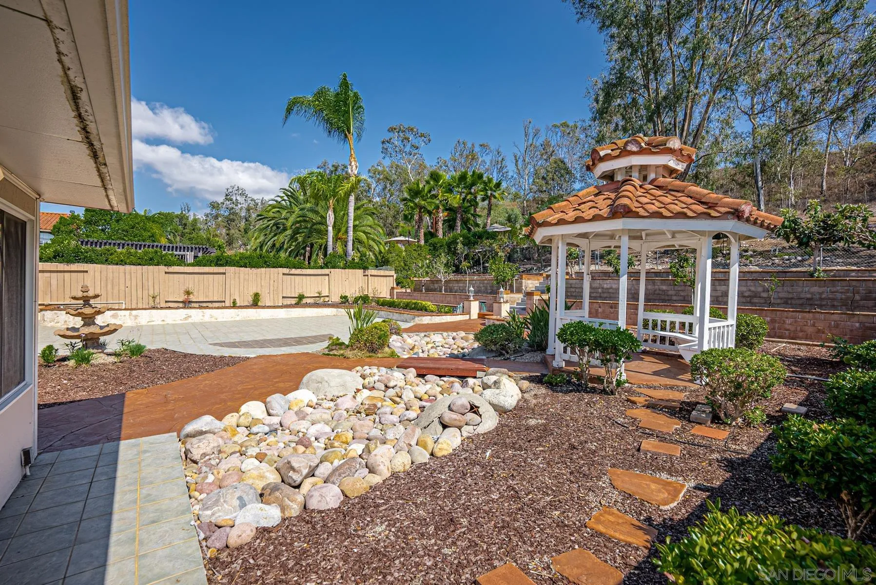 13893 Carriage Road Poway, CA 92064 - Photo 44 of 71 a front view of a house with a yard