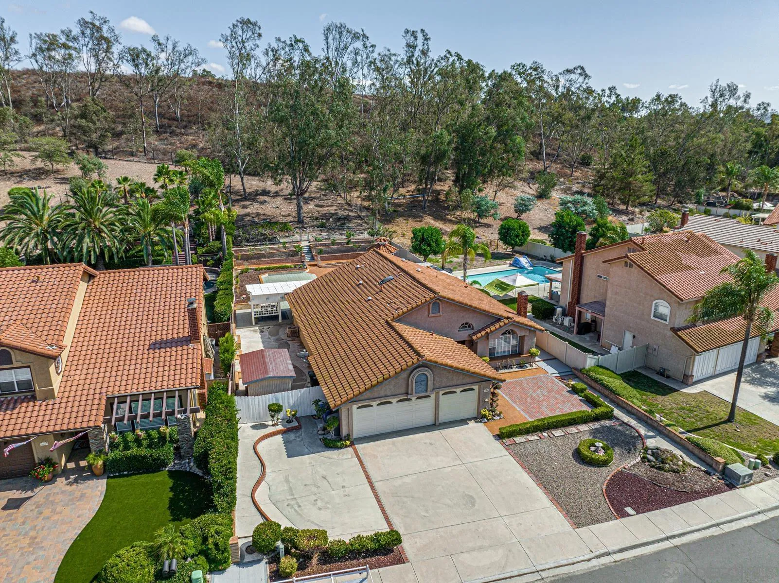 13893 Carriage Road Poway, CA 92064 - Photo 64 of 71 an aerial view of a house with garden space and street view