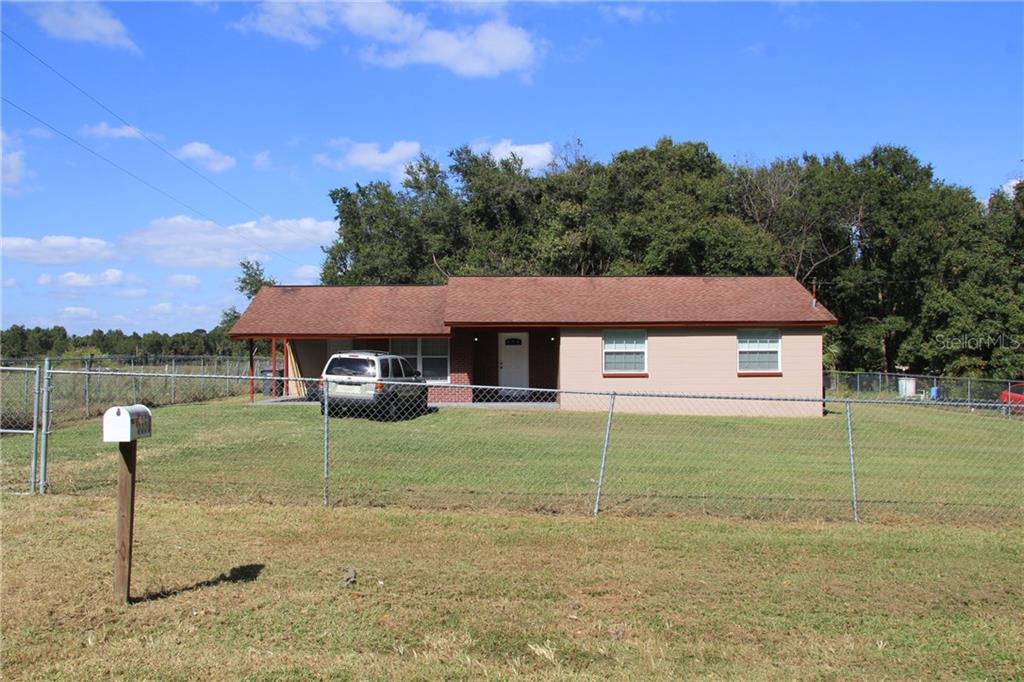 5350 Beulah Church Road Lithia, FL 33547 - Photo 1 of 1 a view of a house with a yard