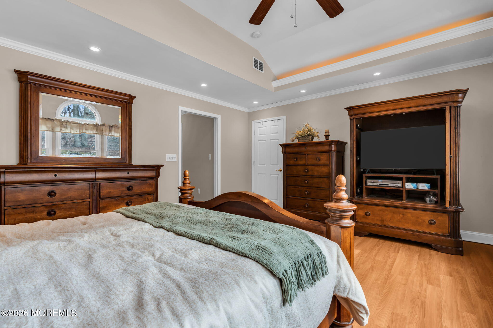 48 Newbury Road Howell, NJ 07731 - Photo 13 of 41 a bedroom with a bed and a flat screen tv