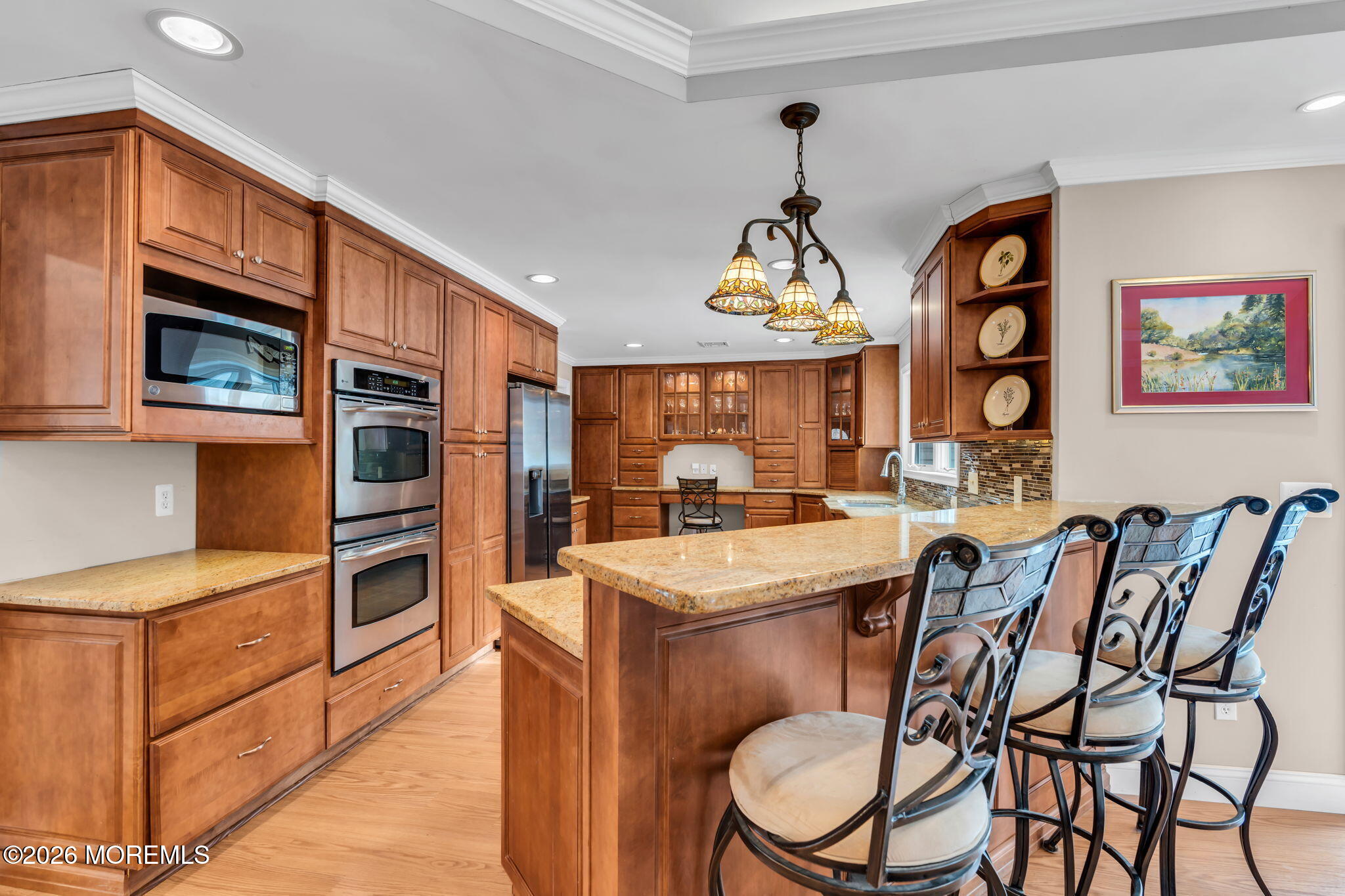 48 Newbury Road Howell, NJ 07731 - Photo 15 of 41 a kitchen that has a table and chairs in it