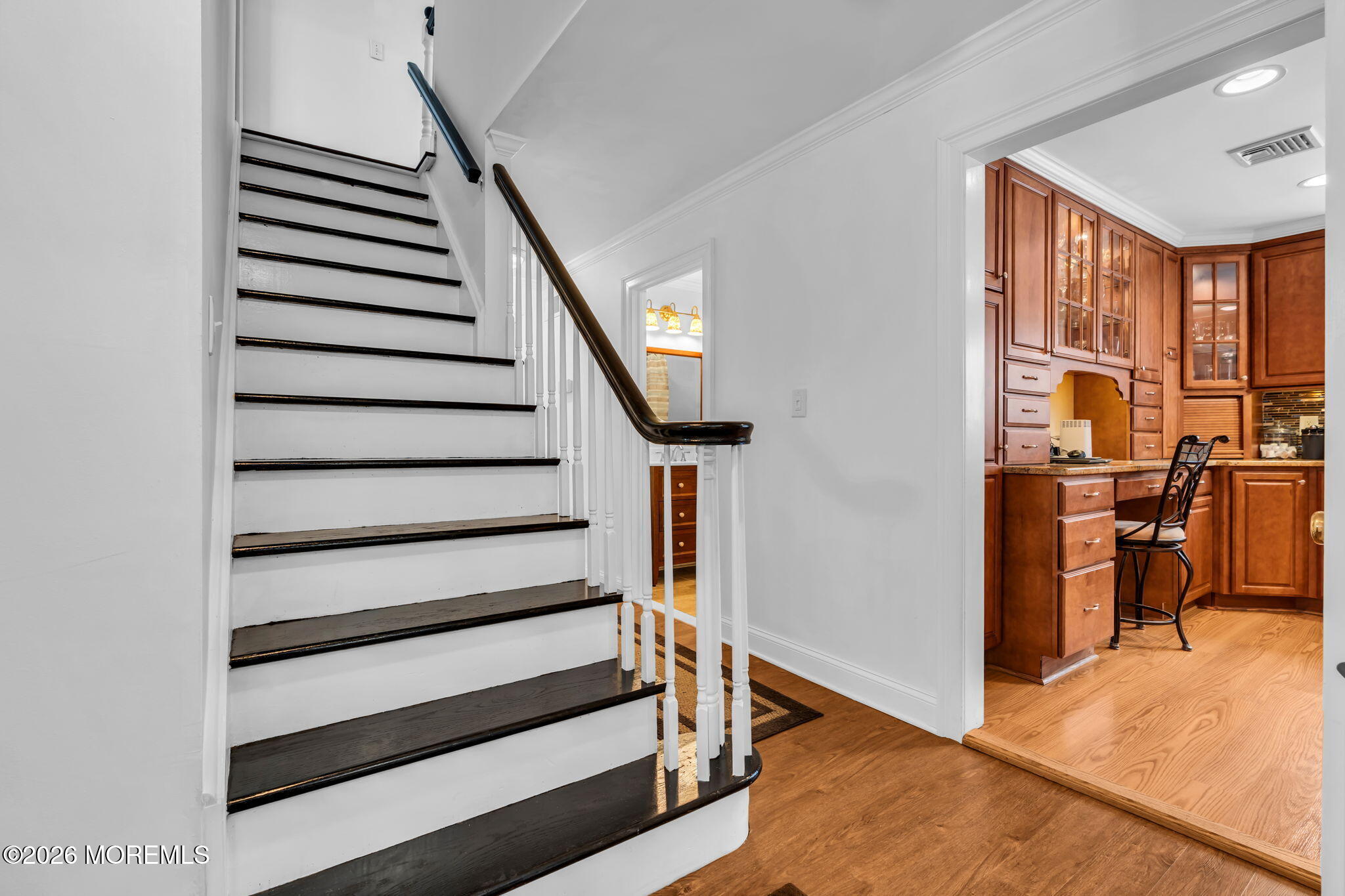 48 Newbury Road Howell, NJ 07731 - Photo 19 of 41 a view of entryway and hall with wooden floor