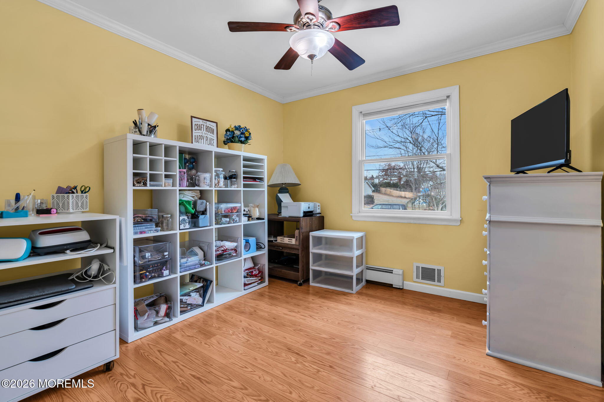48 Newbury Road Howell, NJ 07731 - Photo 21 of 41 a view of a livingroom with furniture and a flat screen tv