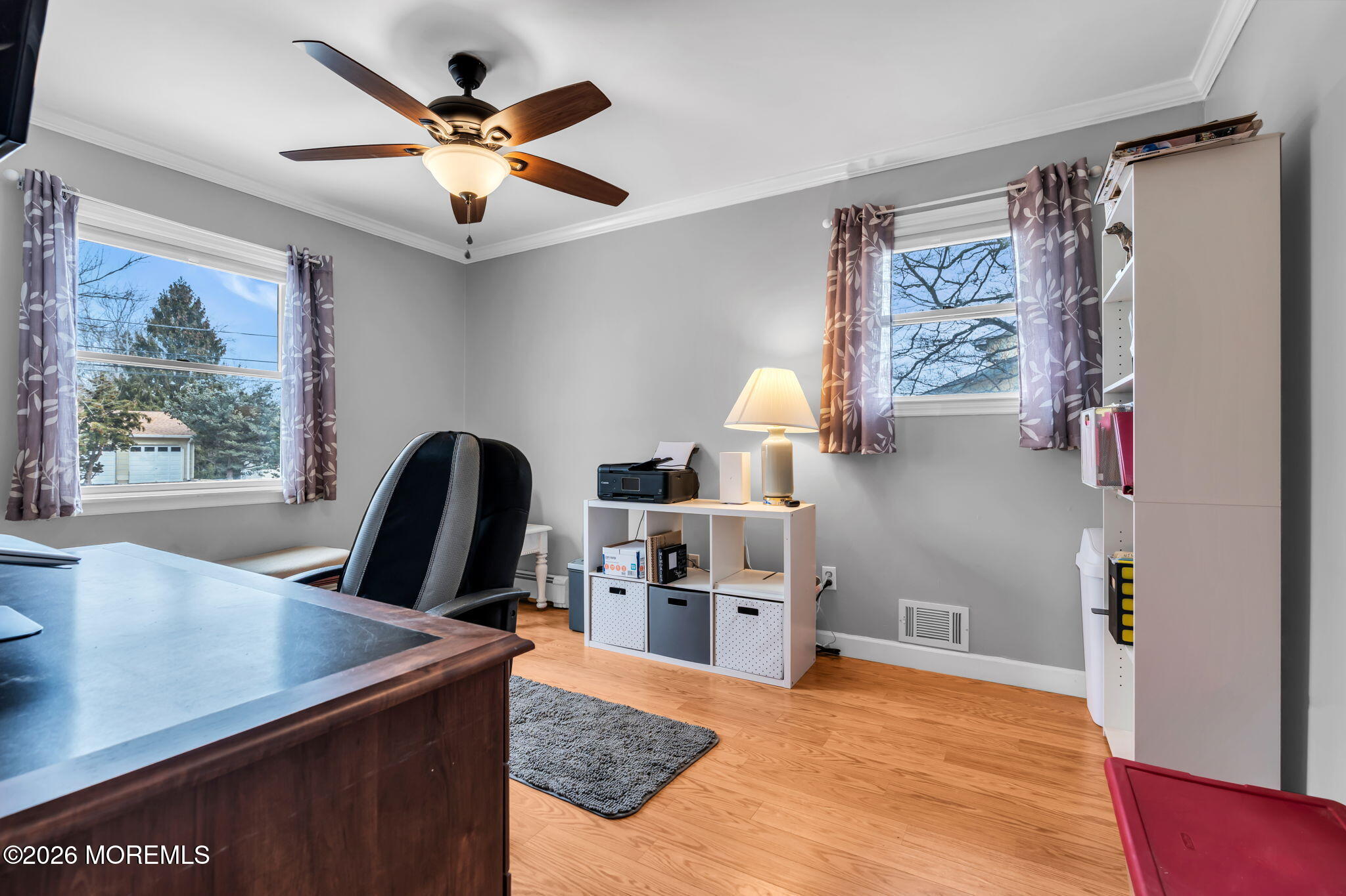 48 Newbury Road Howell, NJ 07731 - Photo 22 of 41 a view of a workspace with furniture and a window