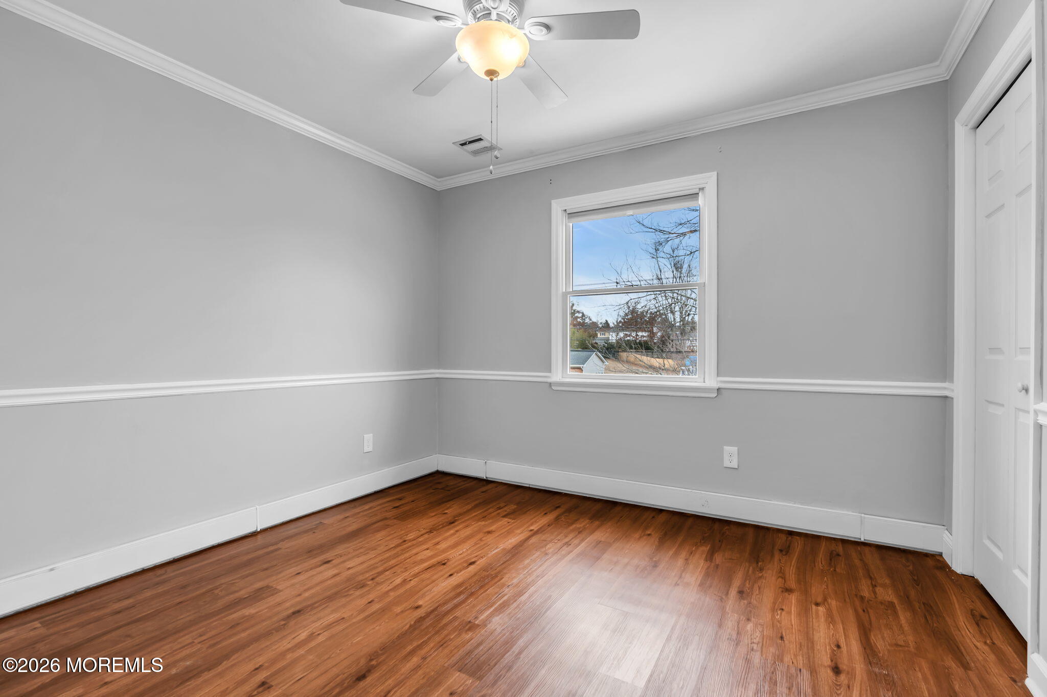 48 Newbury Road Howell, NJ 07731 - Photo 27 of 41 wooden floor in an empty room with a window