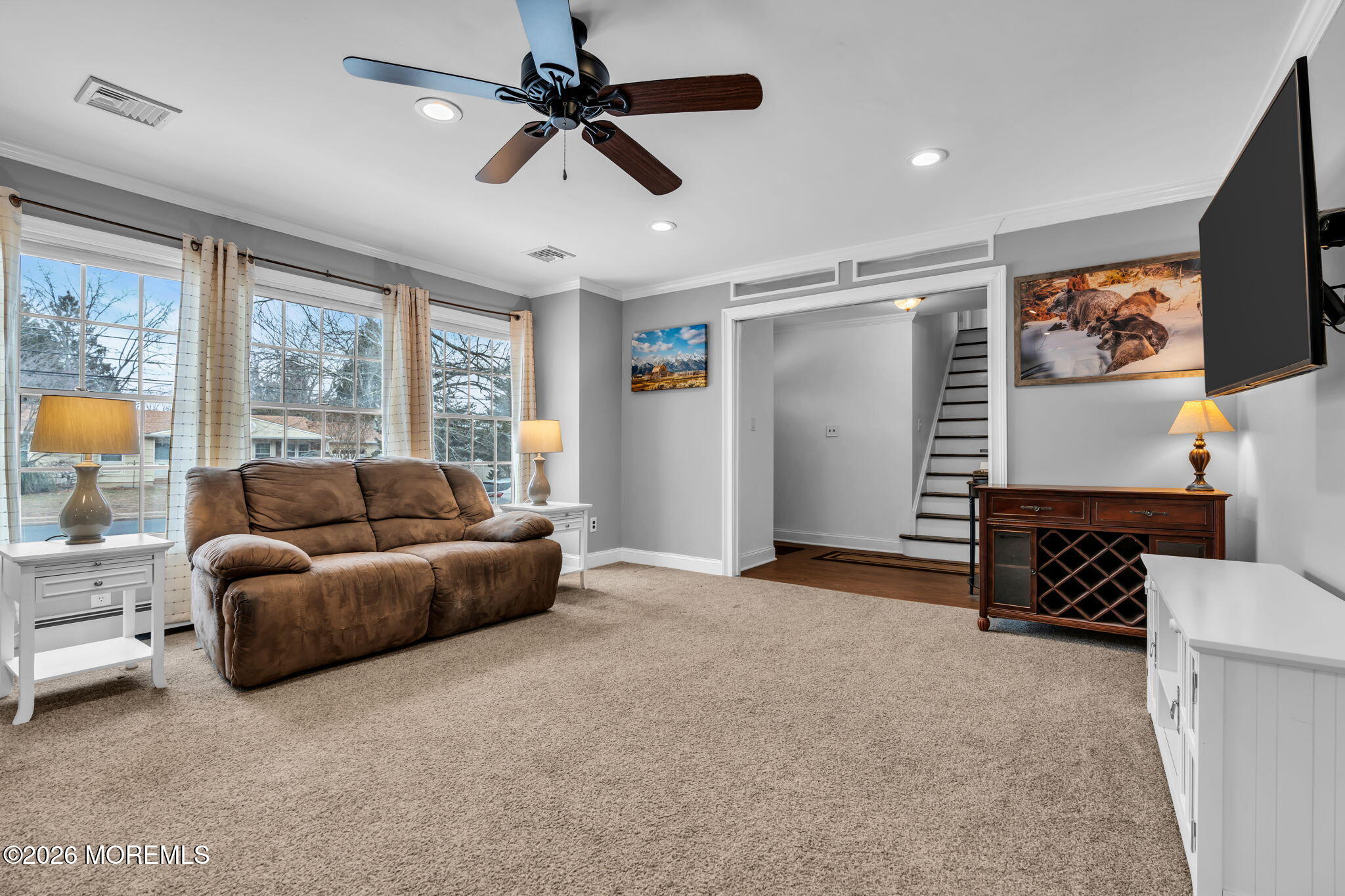 48 Newbury Road Howell, NJ 07731 - Photo 6 of 41 a living room with furniture and a flat screen tv