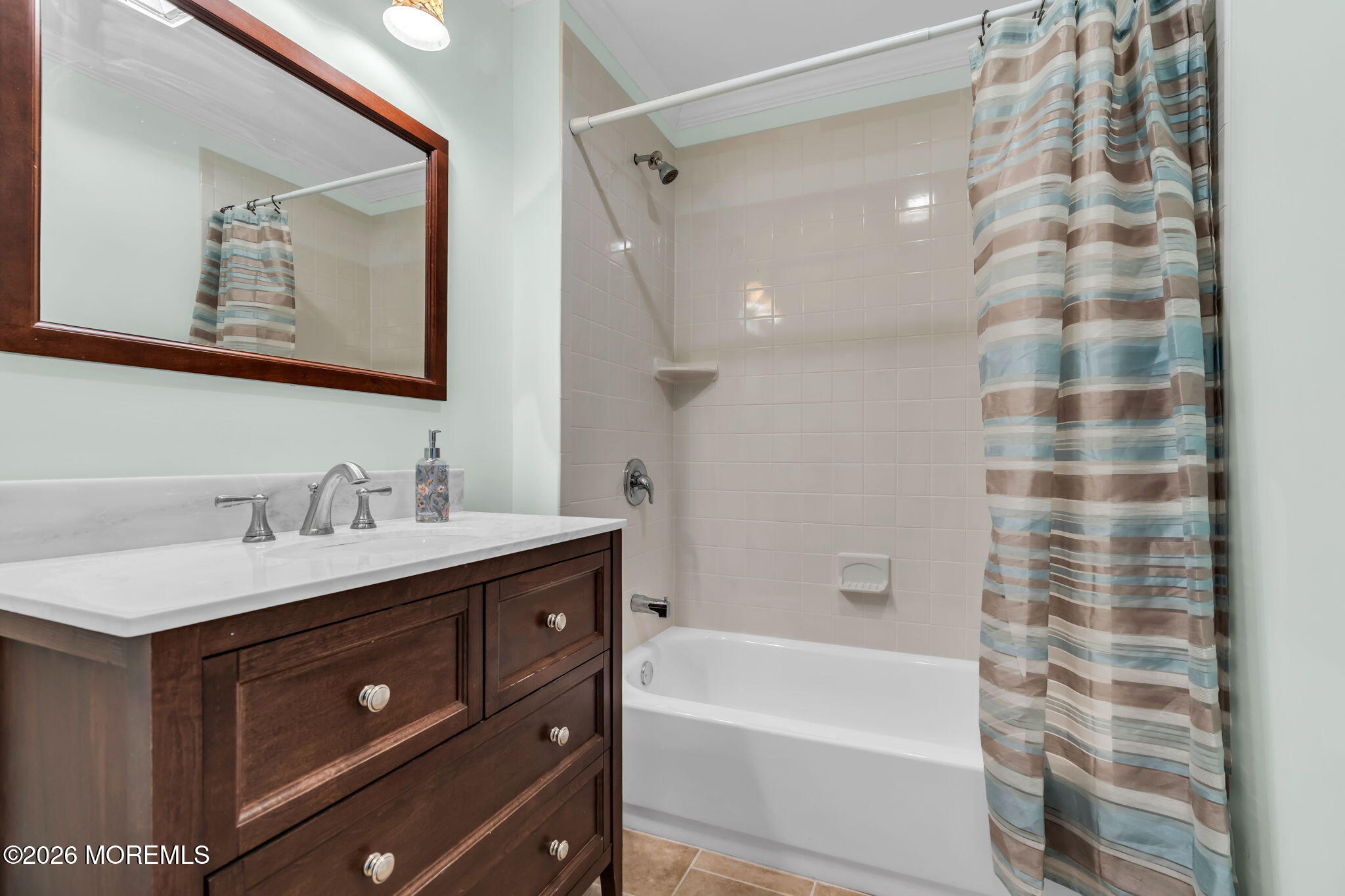 48 Newbury Road Howell, NJ 07731 - Photo 7 of 41 a bathroom with a tub sink and mirror