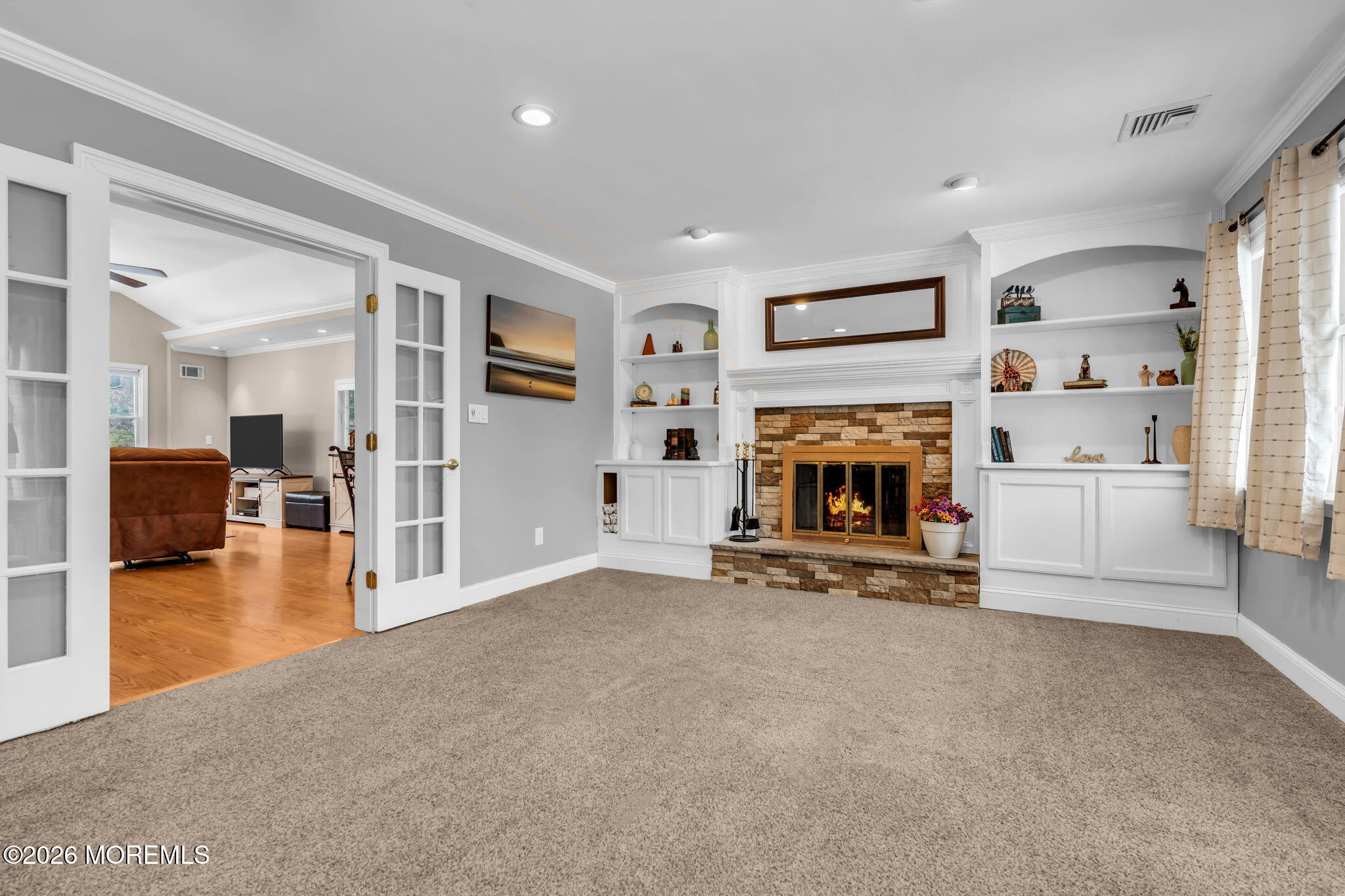 48 Newbury Road Howell, NJ 07731 - Photo 8 of 41 a view of a livingroom with furniture and a fireplace
