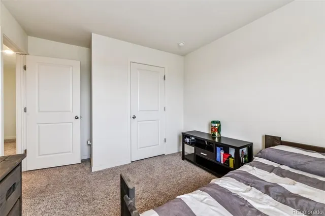 a view of room with a window and a livingroom