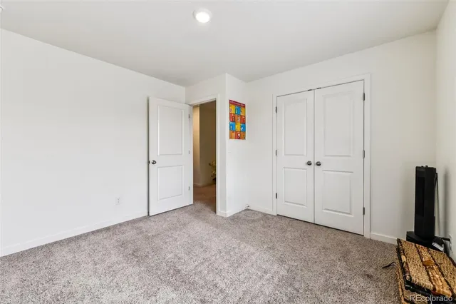 a swimming pool with outdoor seating and yard