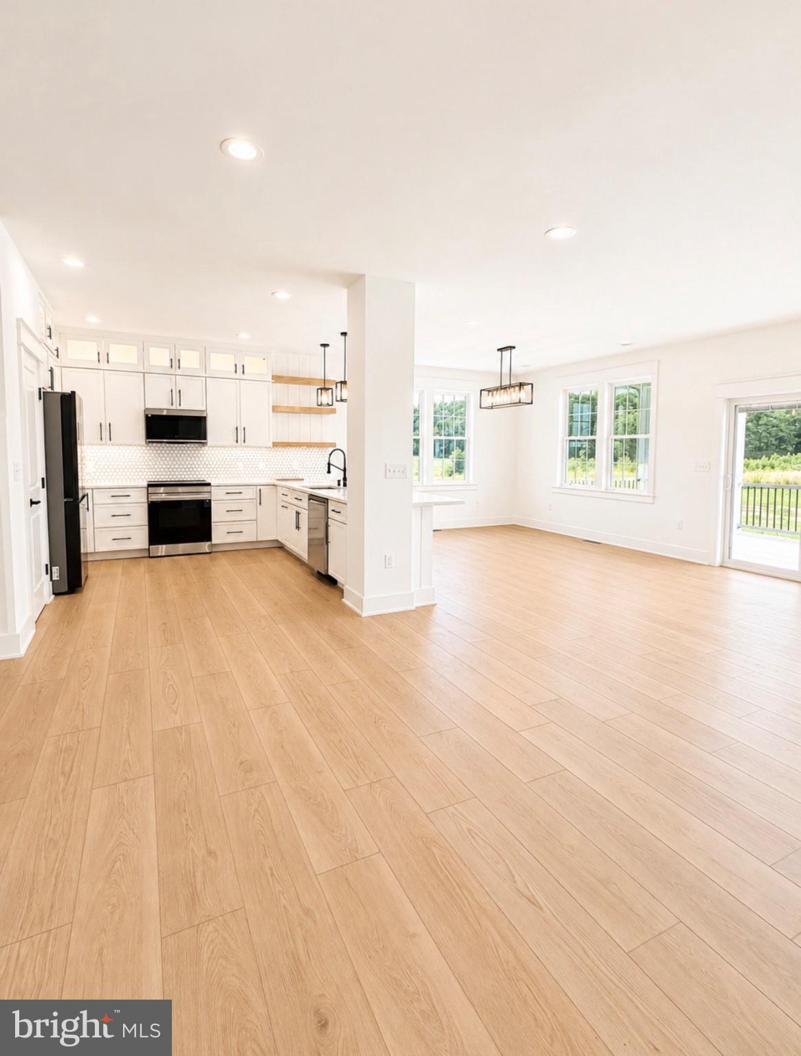 21963 Hardscrabble Road Georgetown, DE 19947 - Photo 9 of 43 Bright and airy open-concept space.