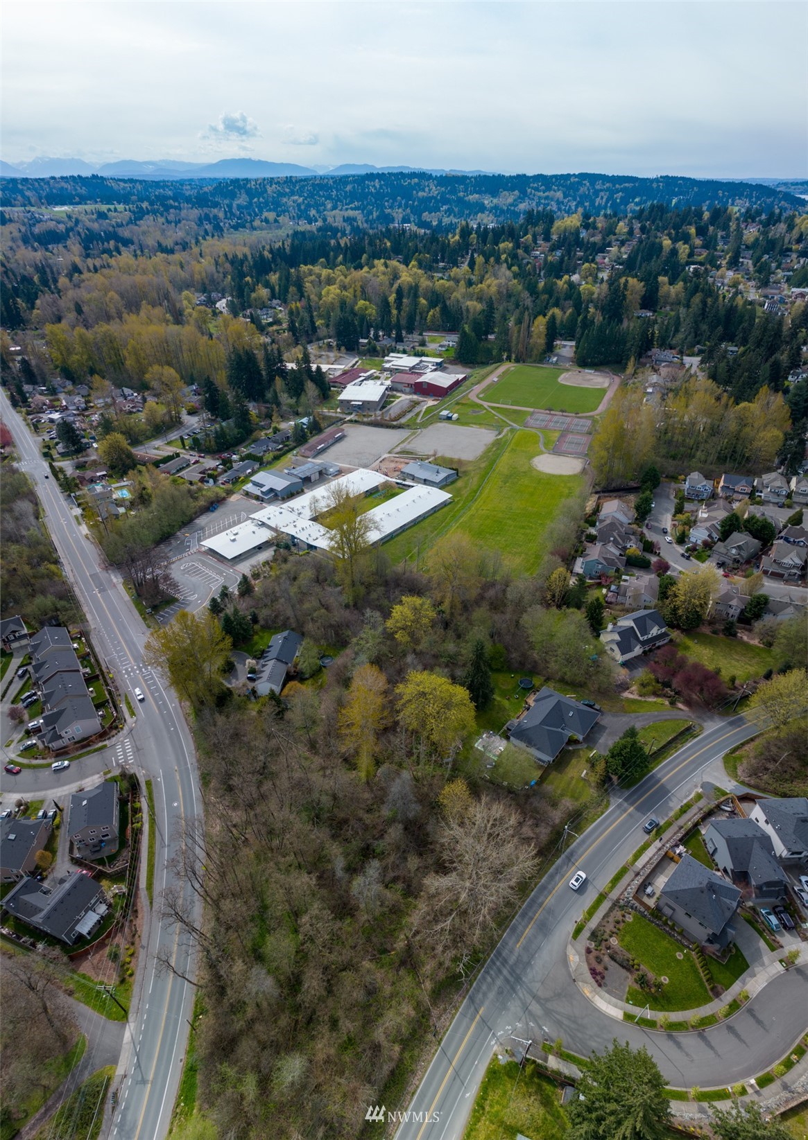 24121 Locust Way Bothell, WA 98021 - Photo 11 of 12 an aerial view of residential houses with outdoor space