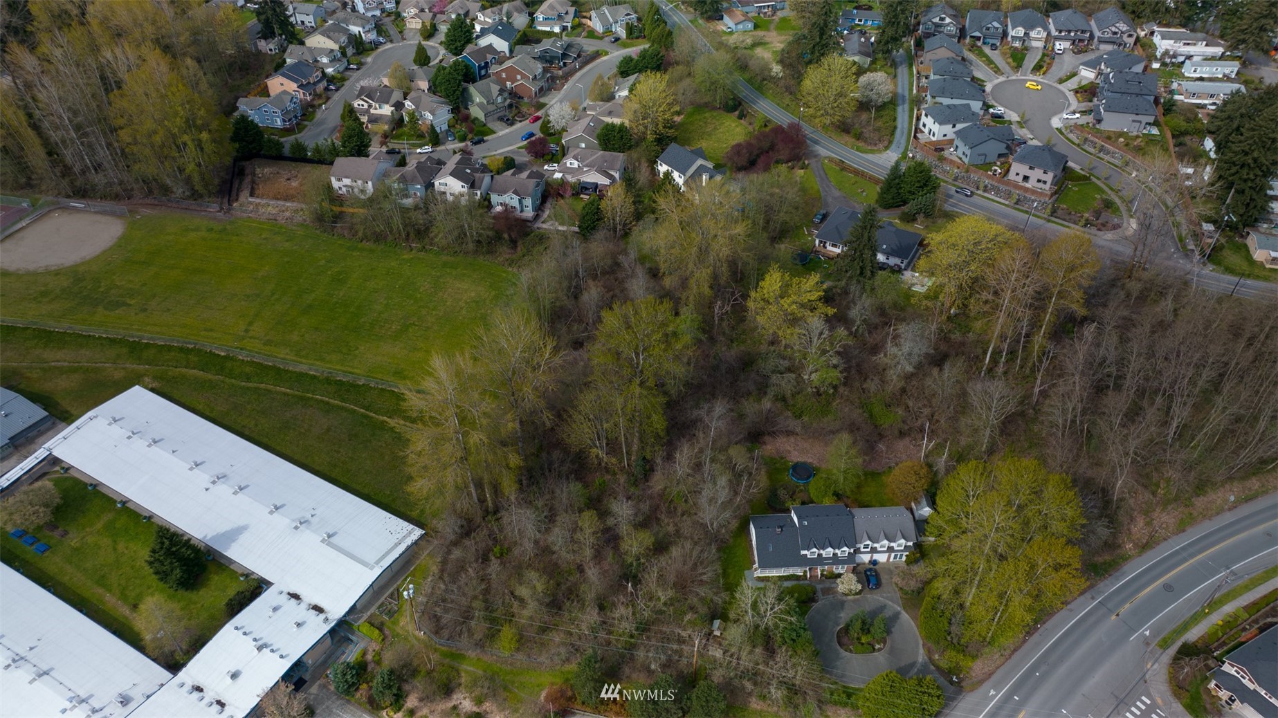 24121 Locust Way Bothell, WA 98021 - Photo 4 of 12 an aerial view of a house with a yard