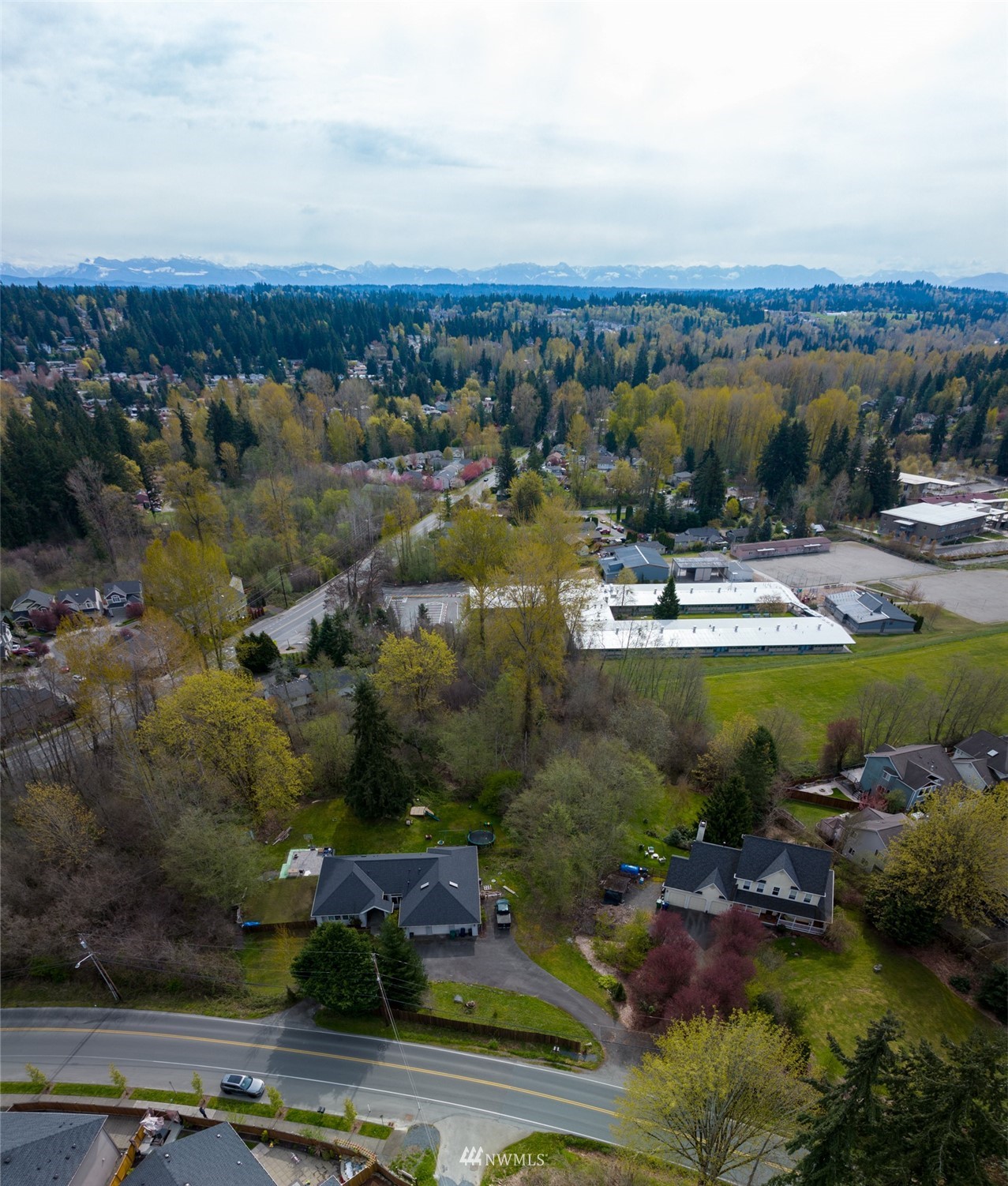 24121 Locust Way Bothell, WA 98021 - Photo 5 of 12 an aerial view of residential house with outdoor space and lake view