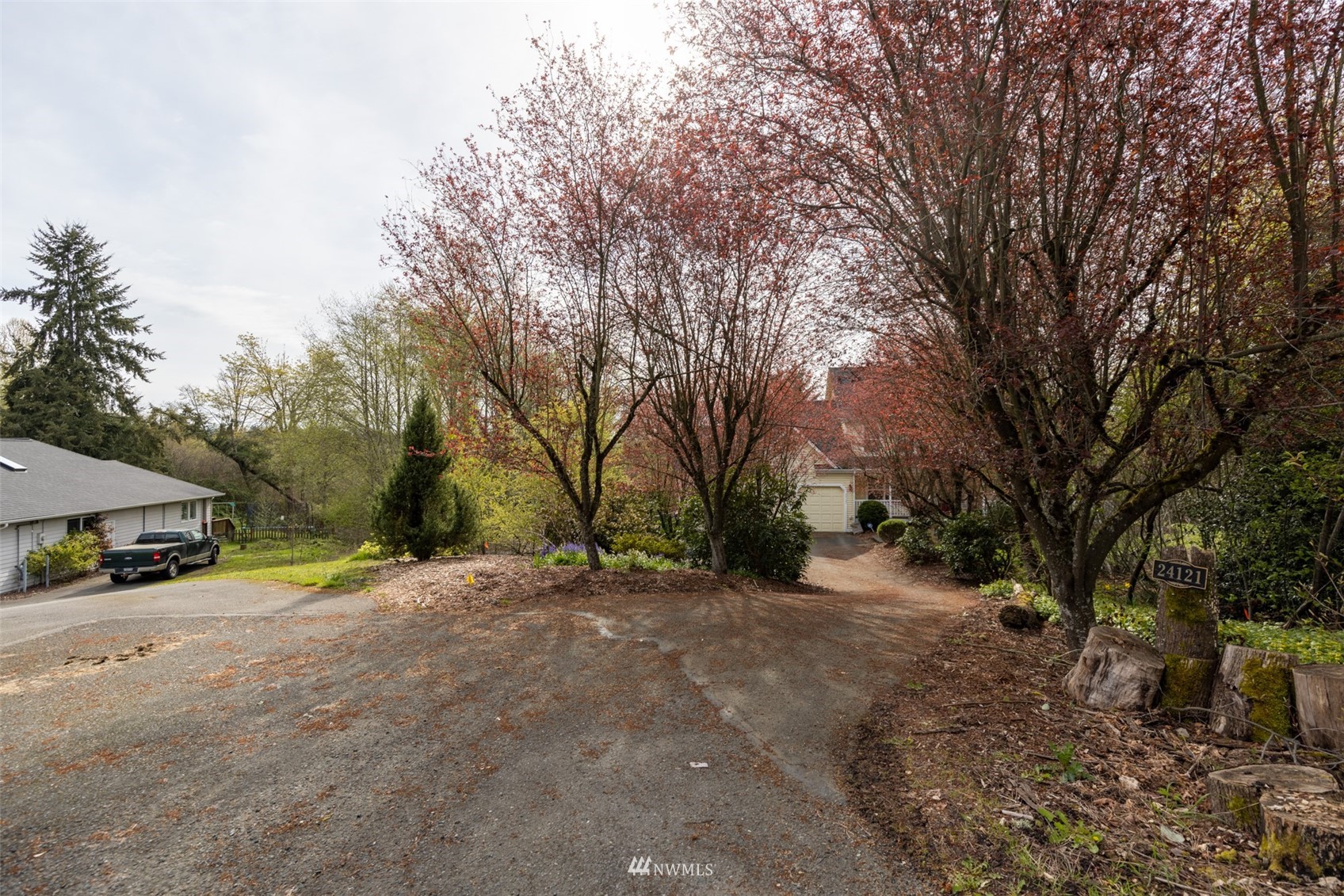 24121 Locust Way Bothell, WA 98021 - Photo 8 of 12 a view of road with trees