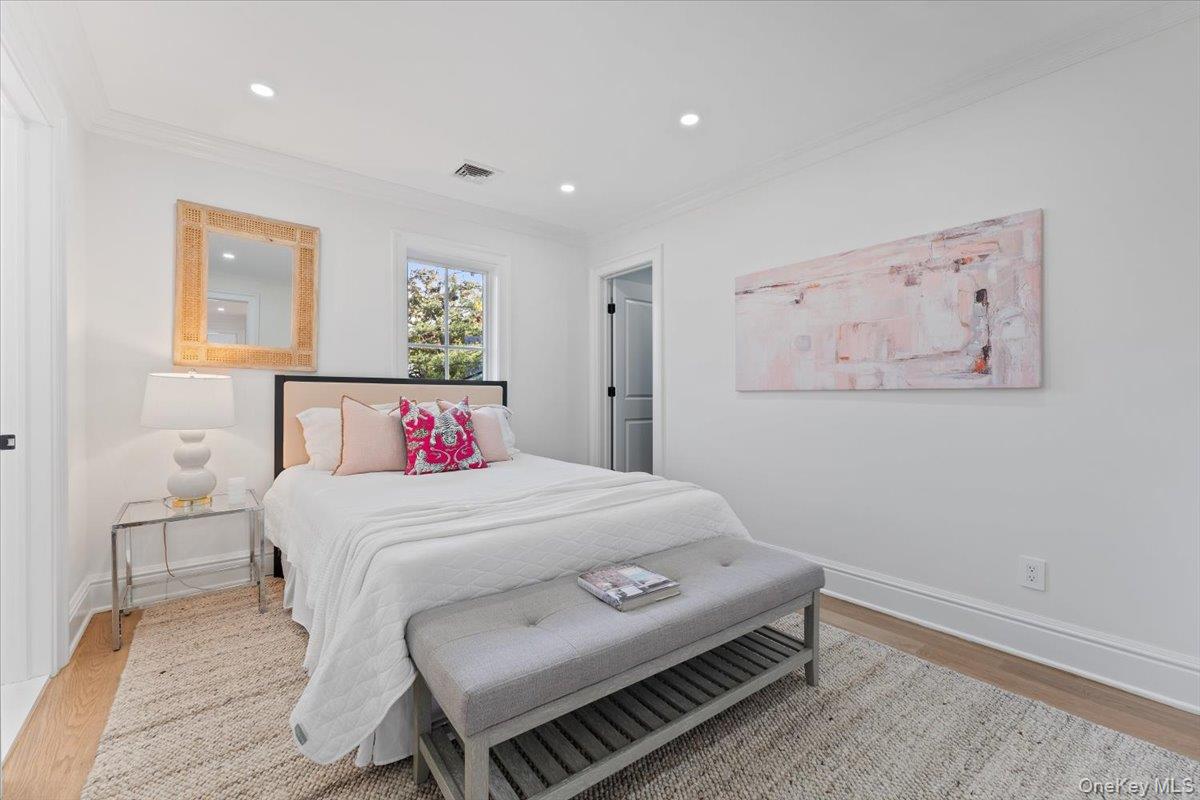 50 Franklin Avenue Rye, NY 10580 - Photo 17 of 45 a bedroom with a bed and a table