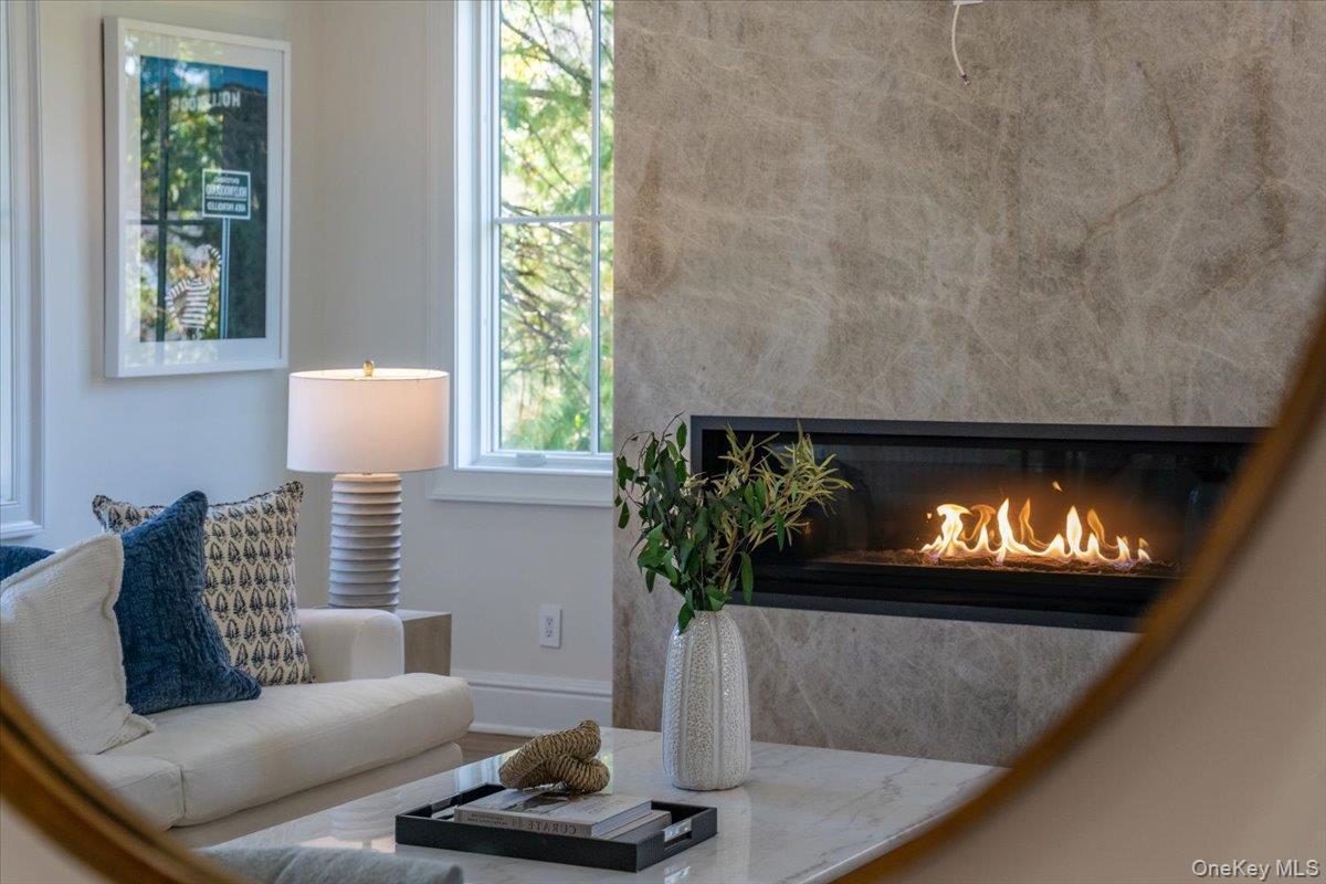 50 Franklin Avenue Rye, NY 10580 - Photo 35 of 45 a living room with furniture and a fireplace