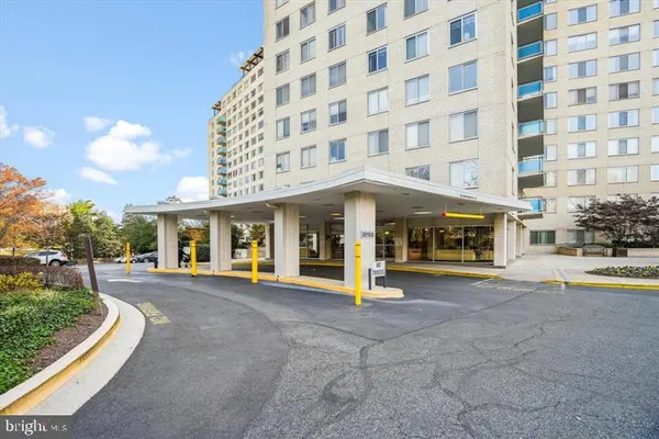 a view of a building with a garden