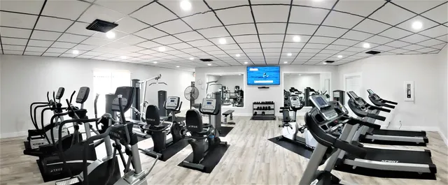 a view of a room with gym equipment