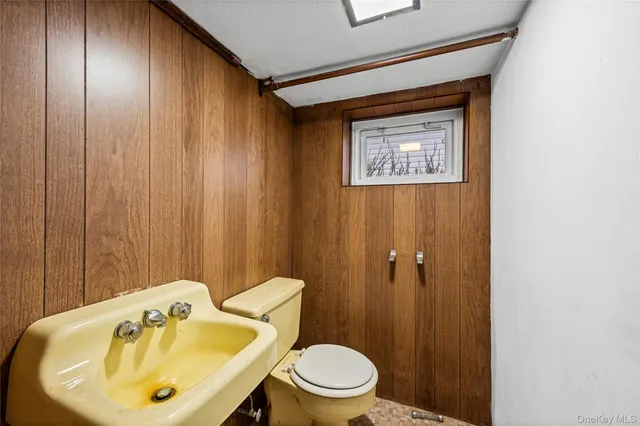 a bathroom with a sink and a toilet