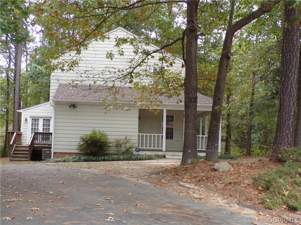 4406 Rabbit Foot Place Chesterfield, VA 23236 - Photo 4 of 21 front view of a house with a yard
