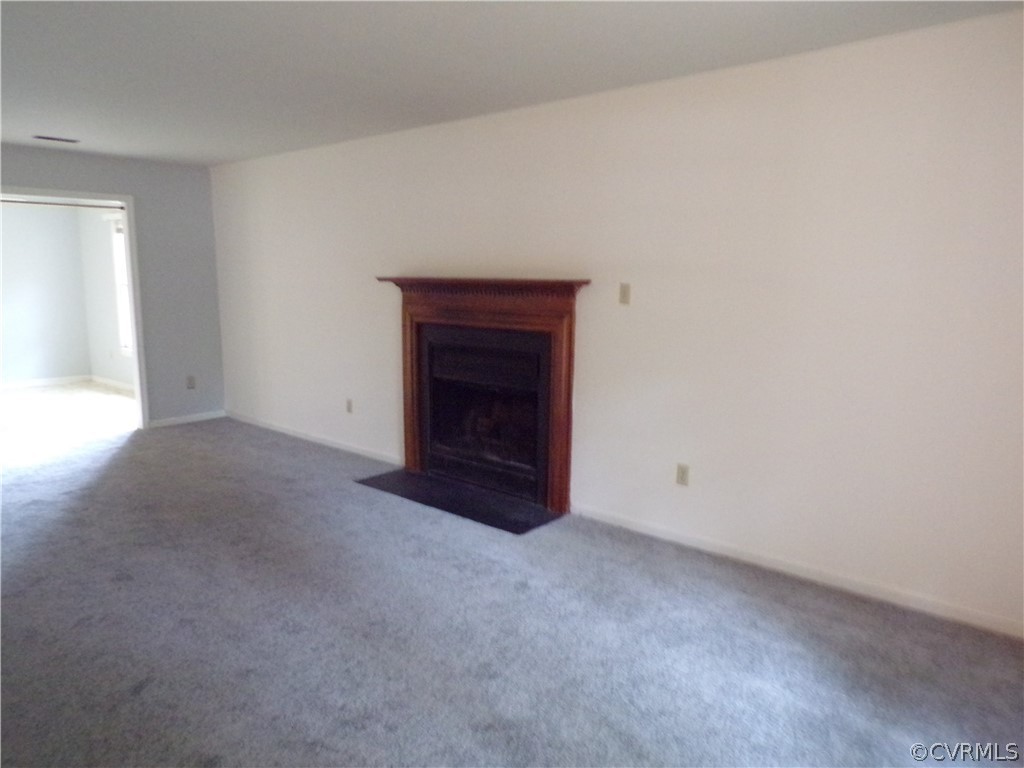 4406 Rabbit Foot Place Chesterfield, VA 23236 - Photo 8 of 21 a view of an empty room with a fireplace