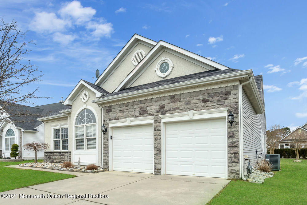 51 Pancoast Road Waretown, NJ 08758 - Photo 2 of 29 a front view of a house with a yard