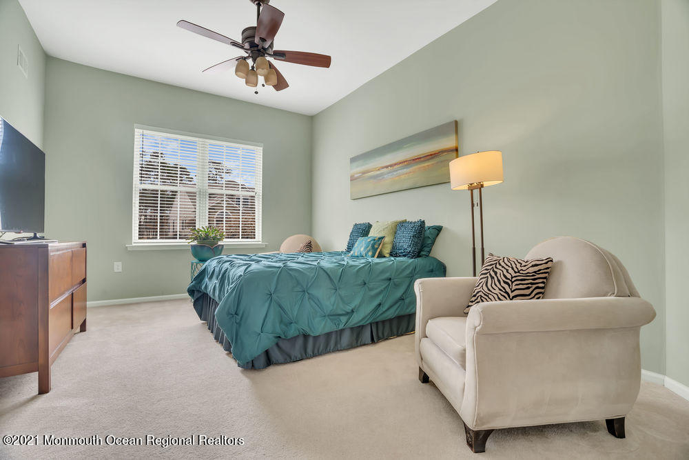 51 Pancoast Road Waretown, NJ 08758 - Photo 17 of 29 a living room with furniture and a window