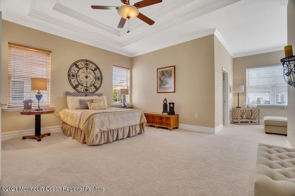 51 Pancoast Road Waretown, NJ 08758 - Photo 19 of 29 a bedroom with furniture and a large window