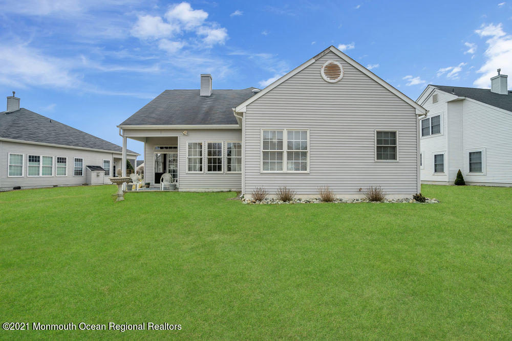 51 Pancoast Road Waretown, NJ 08758 - Photo 28 of 29 a front view of house with yard and green space