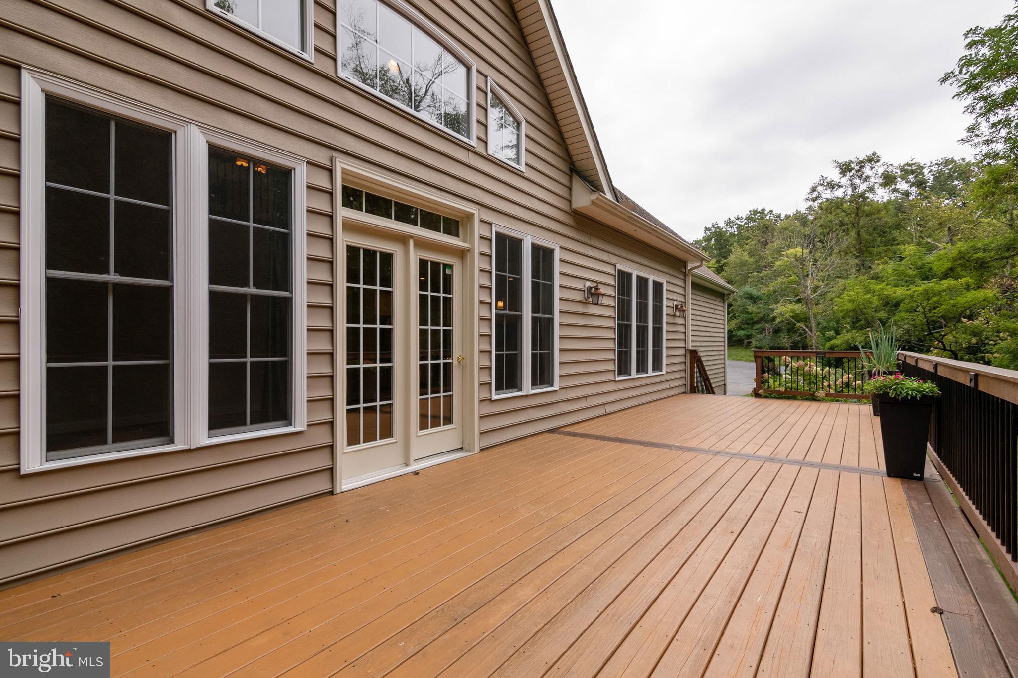 11504 Gambrill Park Road Frederick, MD 21702 - Photo 14 of 67 Deck full length of home